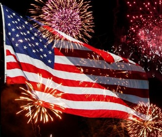 4th of July fireworks over the American flag