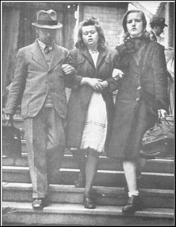German Girl in her teens, leaving a refugee train from the east in September 1945, has just been gang-raped by DP's (displaced persons). Still in shock, she is being escorted from the Berlin train station by two adults -- but no move has been made to arrest the rapists. Allied occupation forces permitted DP's, many of them Jews, to roam freely in Germany and commit any depredations they wished against German civilians.