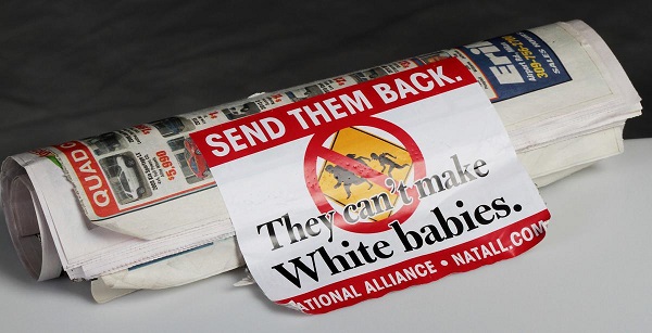 Sticker hijacks free publication.  Oh the horror!