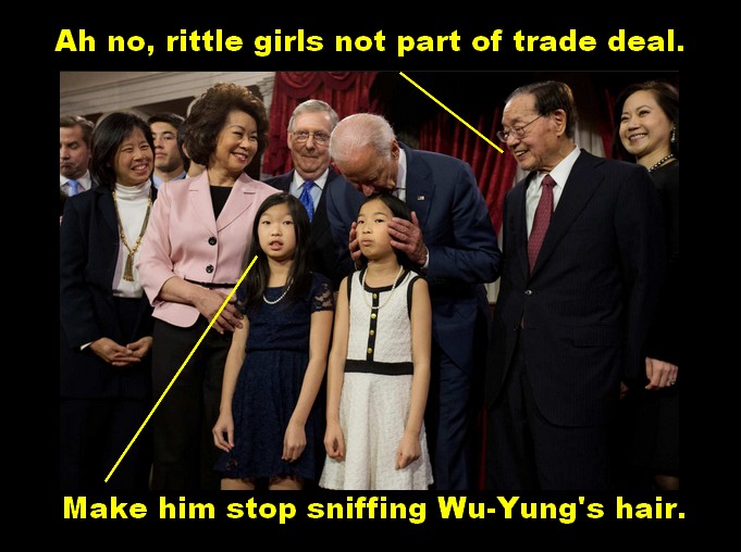 Biden sniffing hair.jpg