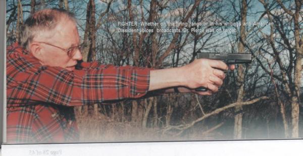 Dr. Pierce practice shooting in the woods